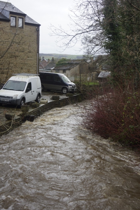 Silsden beck from the footbridge into the park